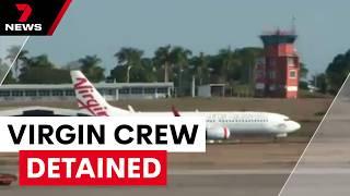 Virgin Airlines crew detained after an alleged robbery and assault | 7NEWS