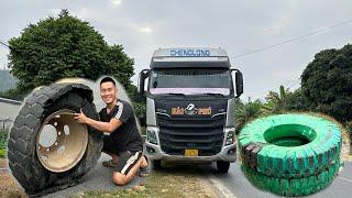 rescue tire change for tractor carrying 100 tons of construction machinery