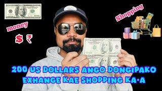 USA a•songni tangka jekon dollars minga ango 100-ni kinggni dongako exchange kae koros ka•a.