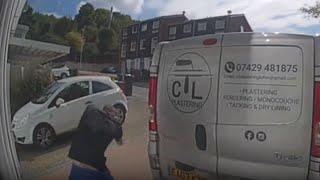 Man hits his head hard on the garage door *CCTV Footage* || WooGlobe