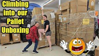 Climbing into our Pallet unboxing and Finding some Crazy stuff!
