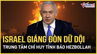 Israel giáng đòn dữ dội vào trung tâm chỉ huy tình báo, kho vũ khí Hezbollah  | Báo VietNamNet