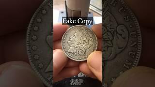 Local Coin Store bought Fake Morgans by mistake, stamp time