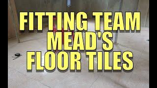 Fitting Team Mead's Floor Tiles