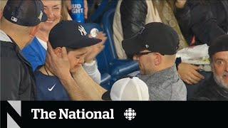 Blue Jays fan gives home-run ball to young Yankees fan