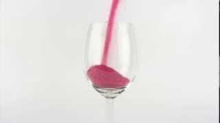 wine glass filled with sand art
