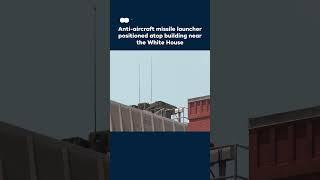 Anti-aircraft missile launcher positioned atop building near the White House