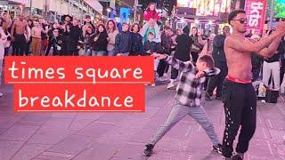 times square breakdance show - mom and kid