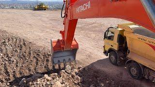 Hitachi Excavator Volvo Trucks Loading