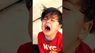 A child dies and her brother cries by burning him 