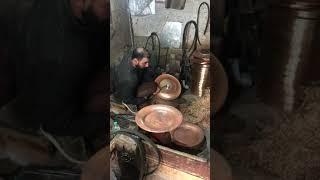Copper finishing workshop, downtown Srinagar , Kashmir, India