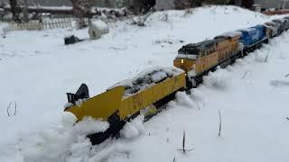 lionel legacy power plowing snow !! snow and train action