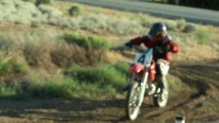 10 year old kicking his dad's butt on CRF150Race!