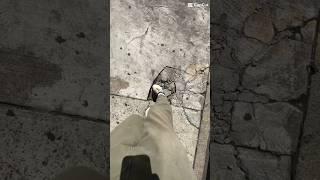 You have never seen this in a hole in the sidewalk