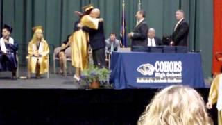Roxanne Daneen Gibbs receivng her High School diploma!