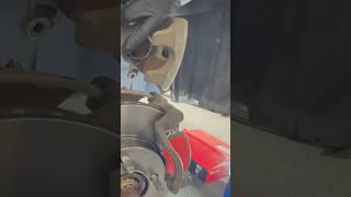 Caliper grease applied to piston & inner caliper surface, and the need to decompress the piston