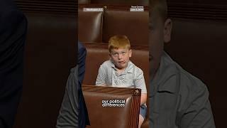 Congressman's son caught makes funny faces during his dad's speech