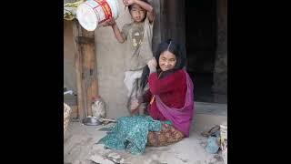 poor family in village. building lifestyle hardly ever. Cooking best meal for kids by  Strong mom