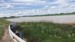 Whirlpool forms in flooded field, road closed in Jonesfield Township