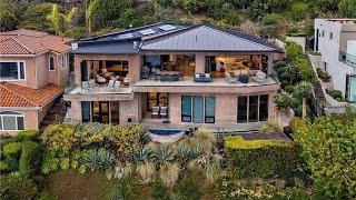 $6,195,000! Contemporary Mystic Hills home in Laguna Beach with majestic Pacific Ocean views