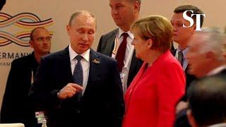 Angela Merkel gives Vladimir Putin epic eye roll