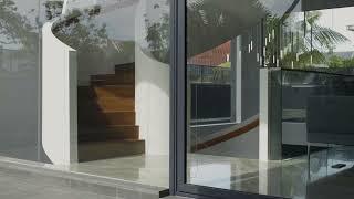 Carve House - a contemporary family home with an open basement and grand spiral staircase.