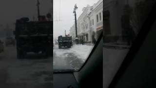 Snow shovelled onto the street in Omsk