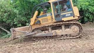 Caterpillar D6G Bulldozer Levels Hard Ground in Farm Road Construction Project