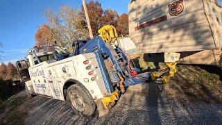 HOW TO TOW A CAMPER WITH A WRECKER!!!      THIS ONE TESTED MY DRIVING SKILLS!!