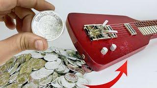 Turning 1600 RadioShack Dollar Coins Into a Lapsteel Guitar