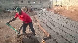 how sand soil is used to make solid blocks for building