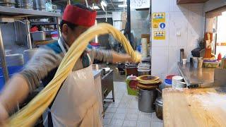 handmade black bean noodles (Jajangmyeon), hand pulled noodles - korean street food