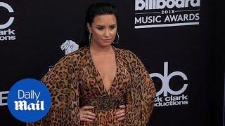 Hear her roar! Demi Lovato dons cheetah print at Billboards - Daily Mail