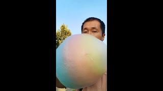 Chinese traditional rainbow cotton candy - 5 RMB（0.7 USD）