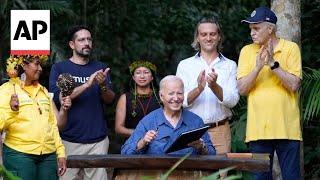 Biden visits Amazon rainforest, says nobody can reverse US progress on clean energy