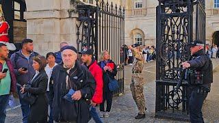 POLICE AND TROOPER GET FIRM WHEN ZOMBIE TOURISTS DON'T BOTHER TO LISTEN at Horse Guards!