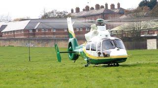 Great North Air Ambulance Service landing & taking off from field.