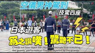 Check out how much the Japanese tourists love watching the guards' performance! They’re stunned …