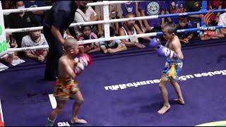 Muay Thai Child boxer punching out of poverty