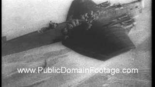1938 Russian paratroopers jump from wings of plane newsreel archival footage