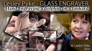 Hand glass engraving - dolphin on a cystal tankard