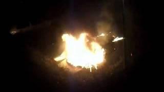 Car on fire in the middle of the night