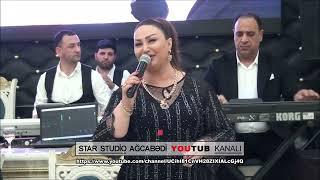 gözel bir toy açılışı oxuyur Nigar Agcabedili tamada Azer İslamoglu sintez Aydin aliyev gitara Tural