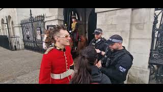 Police confront man dressed as a kings guard making a rap video #thekingsguard