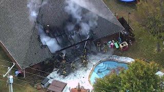 Crews battle damaging house fire in northwest OKC neighborhood