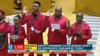 Julius Malema dances on his way to being sworn in