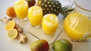 Fresh Pineapple, Mango, Lemon, Ginger, and Orange drink I best tropical juice to promote good health