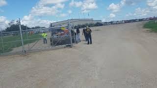 Aztec Crew joking around on a gate adjustment