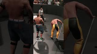 Attitude Adjustment through the announcers table. #videogames #gaming #wwe2k23 #cena