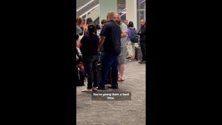 Father confronts man who told off his girls on flight